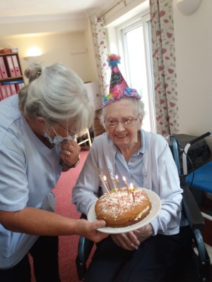 Joan and her Birthday Cake at our Residential Nursing Home in Kettering